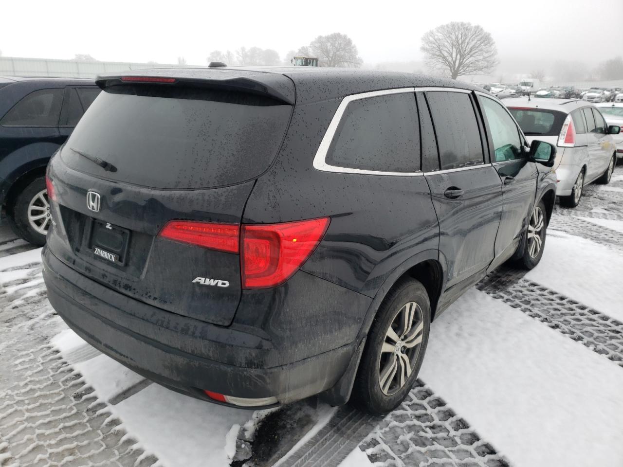 Photo 4 from auction – 2018 HONDA PILOT EXL with VIN 5FNYF6H55JB065868