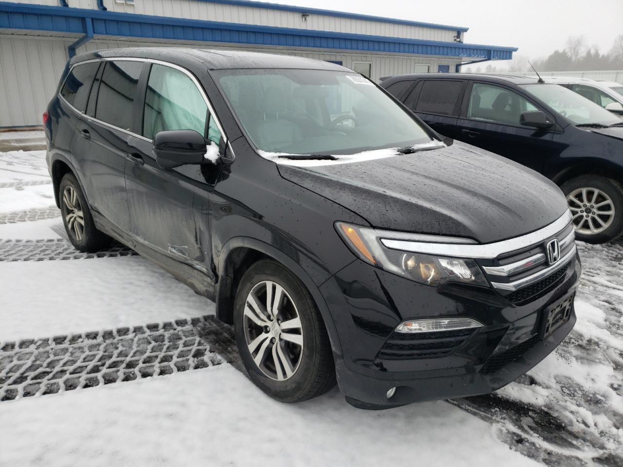HONDA PILOT EXL 2018 with VIN 5FNYF6H55JB065868 - Photo from auction