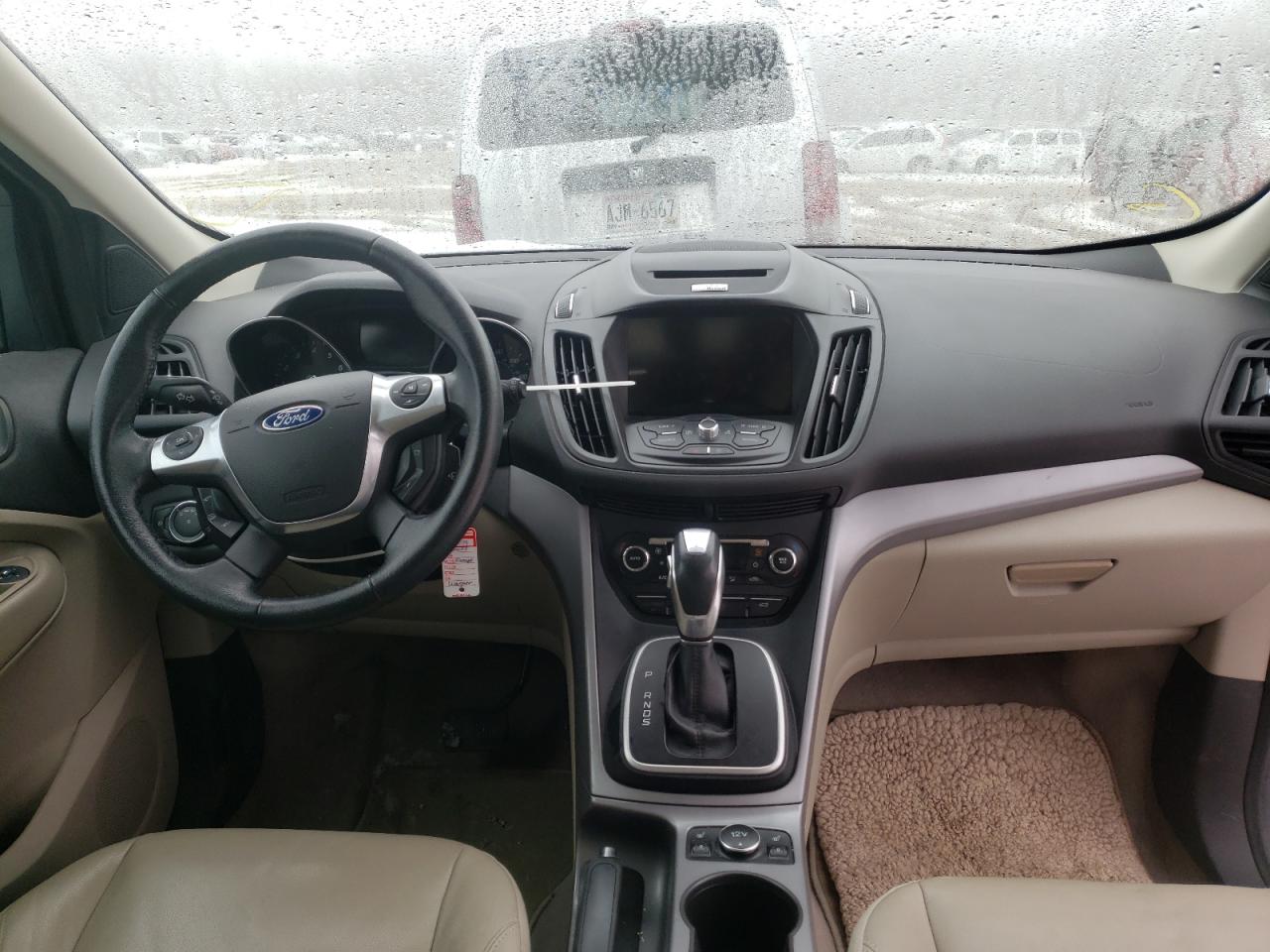 Photo 9 from auction – 2014 FORD ESCAPE SE with VIN 1FMCU0G94EUB45821