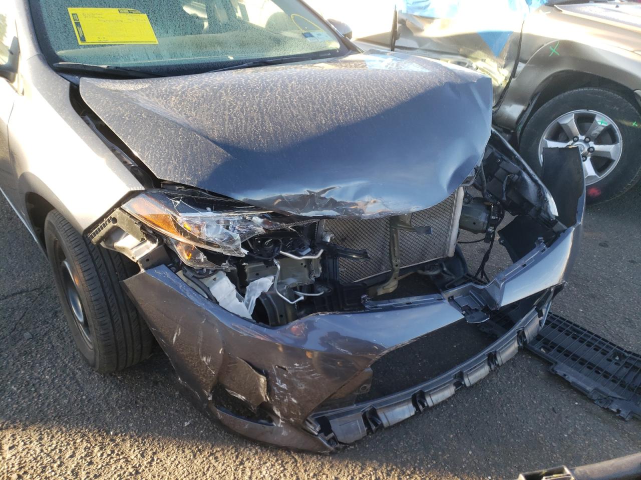 Photo 9 from auction – 2017 TOYOTA COROLLA L with VIN 5YFBURHE8HP688297