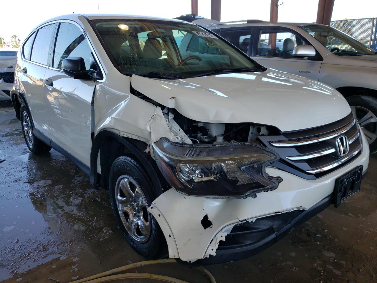 HONDA CR-V LX 2014 with VIN 5J6RM4H3XEL096883 - Photo from auction