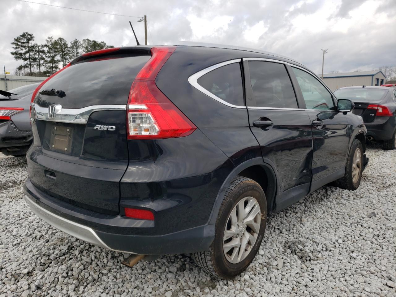 Photo 4 from auction – 2015 HONDA CR-V EXL with VIN 5J6RM4H76FL133190