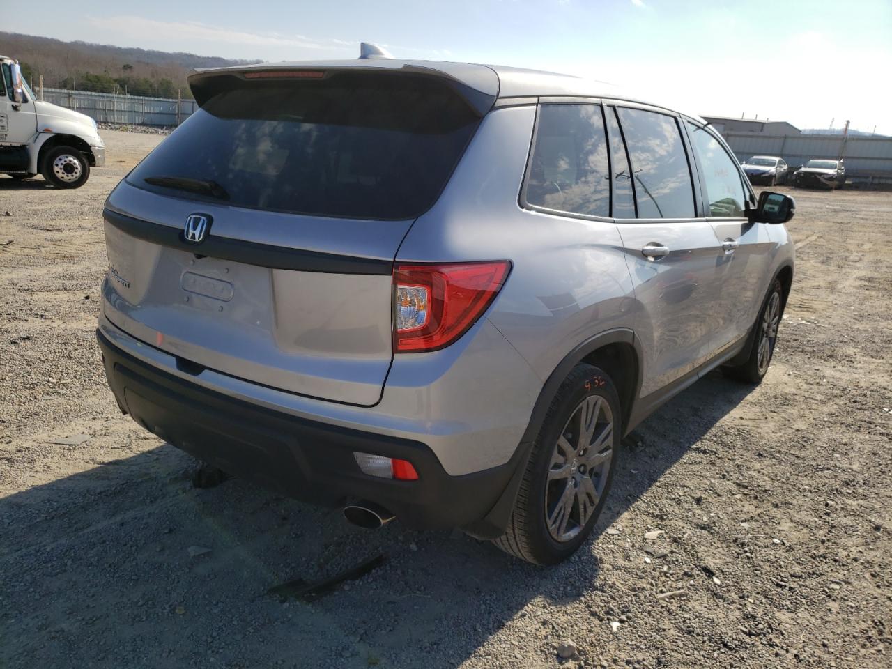 Photo 4 from auction – 2020 HONDA PASSPORT E with VIN 5FNYF7H56LB004375