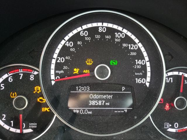 Photo 8 from auction – 2014 VOLKSWAGEN BEETLE with VIN 3VWJX7AT2EM629035