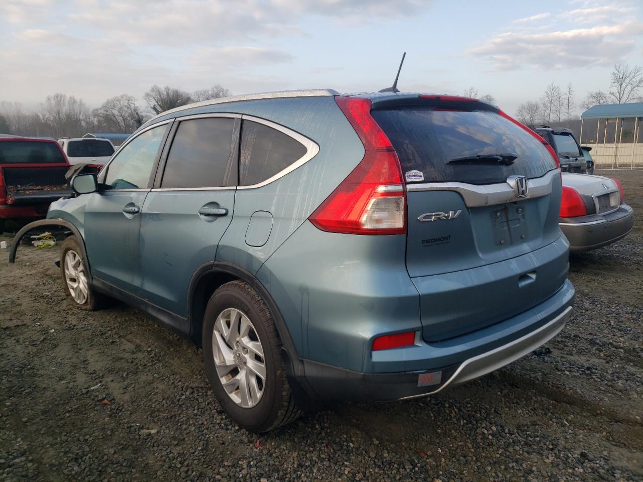Photo 3 from auction – 2015 HONDA CR-V EXL with VIN 2HKRM3H79FH531210