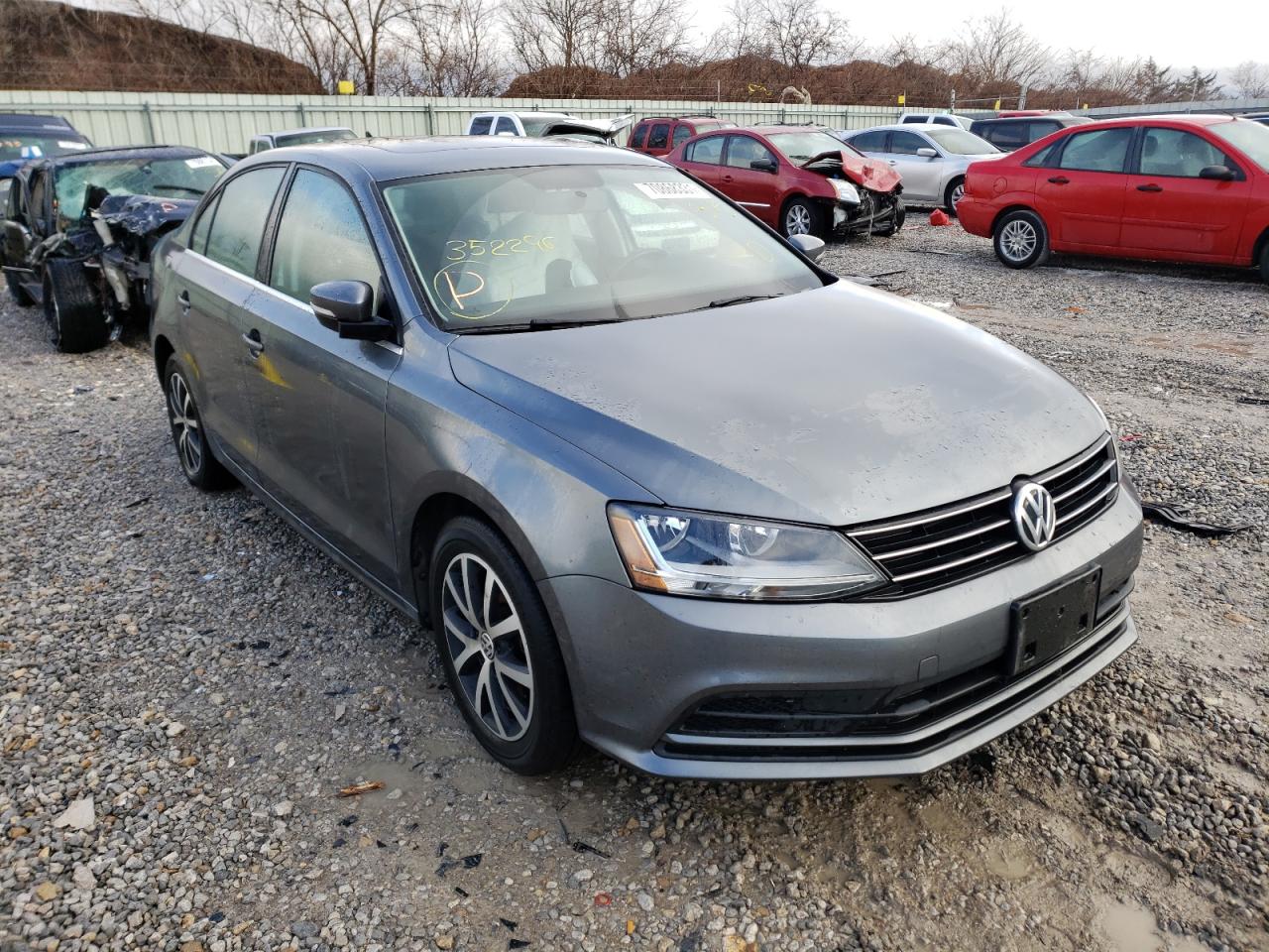 VOLKSWAGEN JETTA SE 2017 with VIN 3VWDB7AJ5HM352296 - Photo from auction