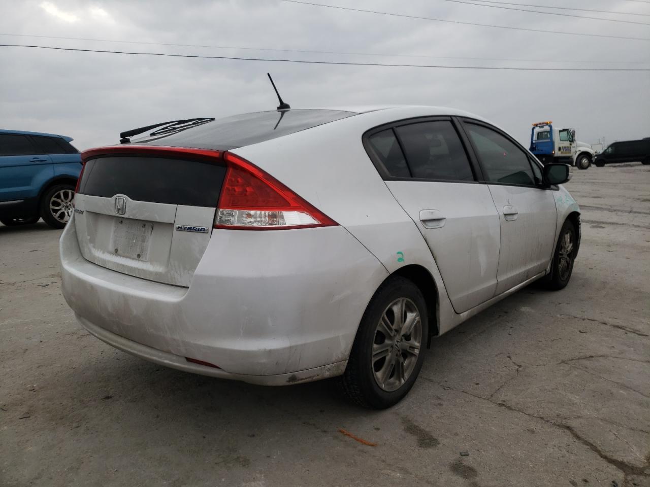 Photo 4 from auction – 2010 HONDA INSIGHT EX with VIN JHMZE2H77AS038111