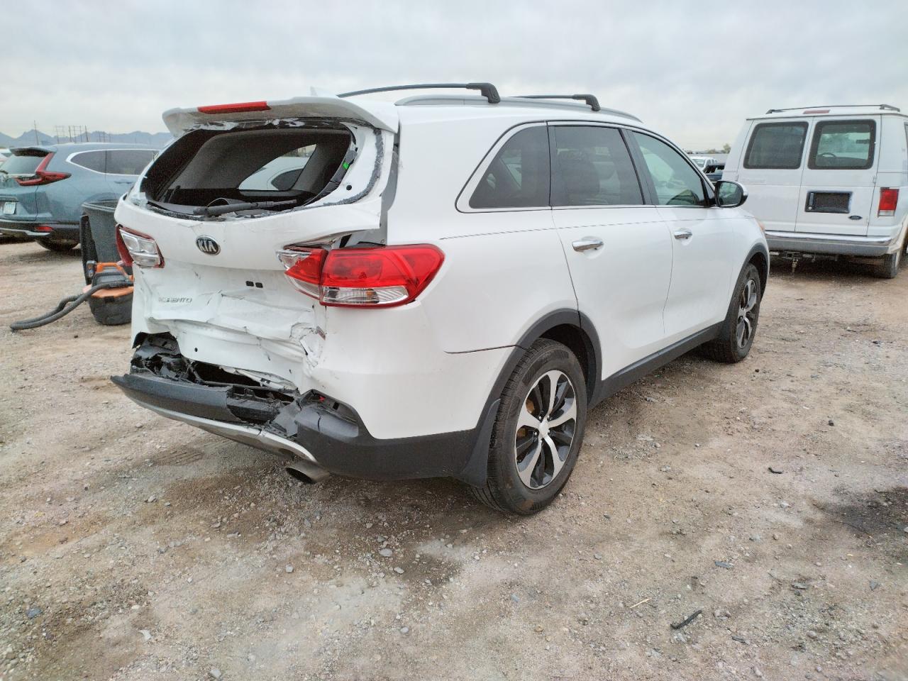 Photo 4 from auction – 2016 KIA SORENTO EX with VIN 5XYPH4A19GG014344