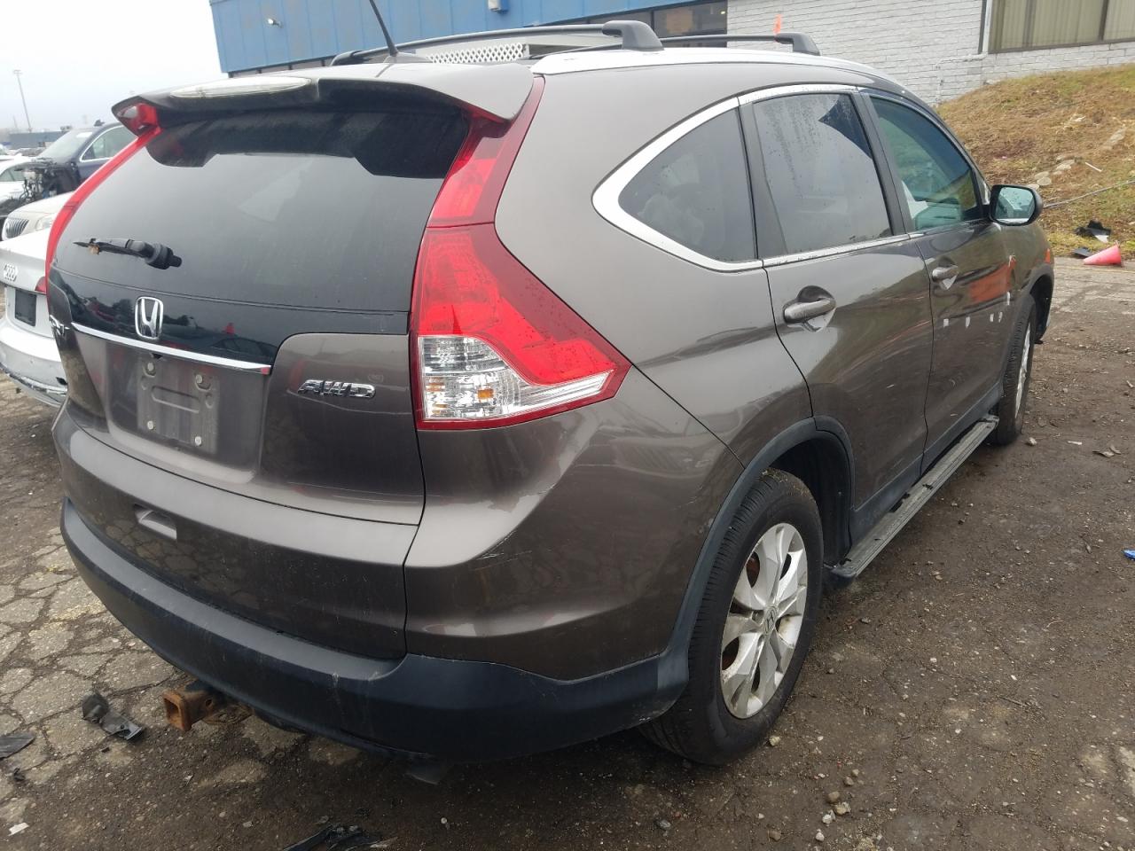 Photo 4 from auction – 2014 HONDA CR-V EXL with VIN 2HKRM4H78EH690210