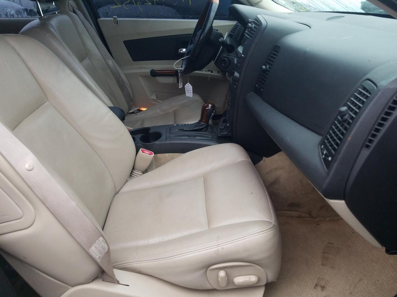 Photo 5 from auction – 2003 CADILLAC CTS with VIN 1G6DM57N430166405