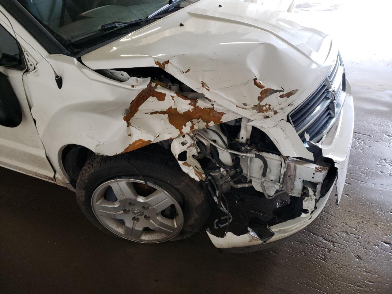 Фото 9 с аукциона – 2009 DODGE CALIBER SX с VIN 1B3HB48A09D184655