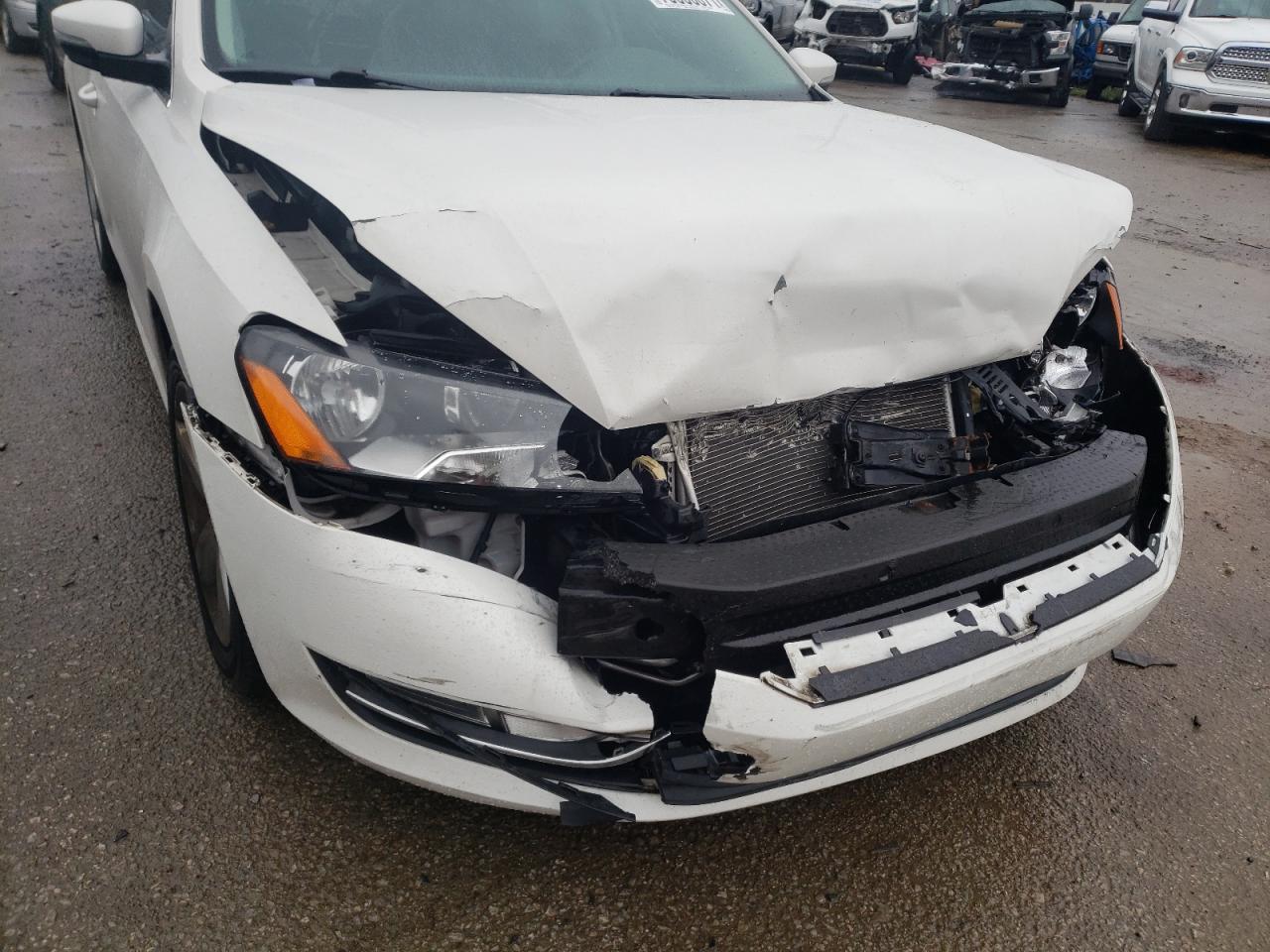 Photo 9 from auction – 2015 VOLKSWAGEN PASSAT S with VIN 1VWAT7A30FC083592