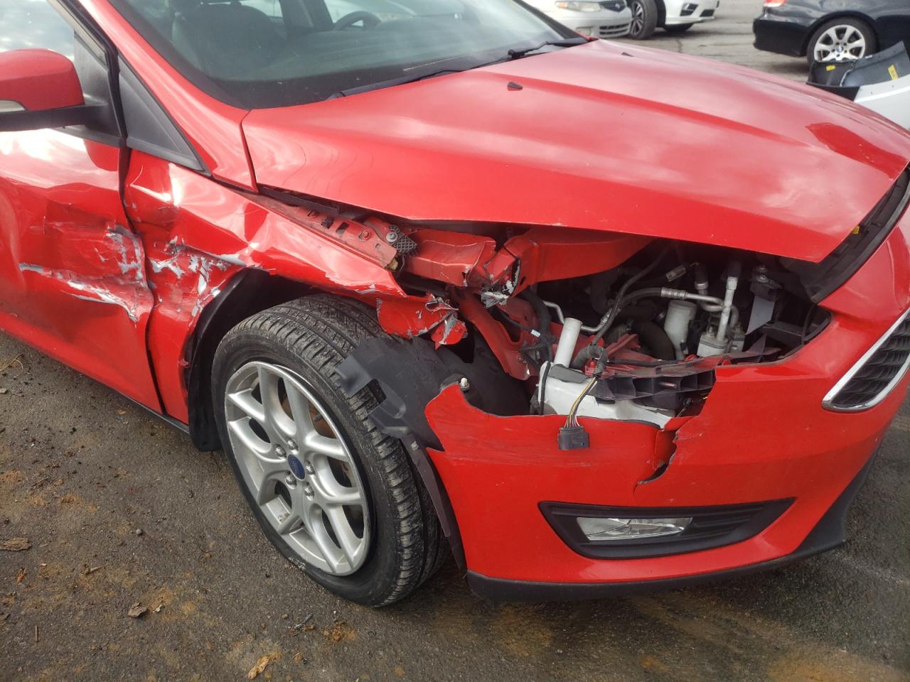 Photo 9 from auction – 2015 FORD FOCUS SE with VIN 1FADP3F21FL244597