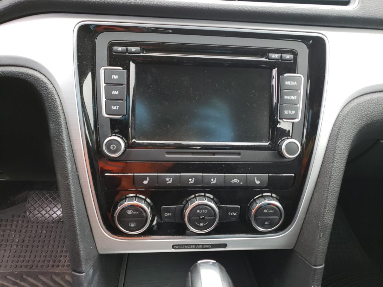Photo 9 from auction – 2012 VOLKSWAGEN PASSAT SE with VIN 1VWBH7A36CC077457