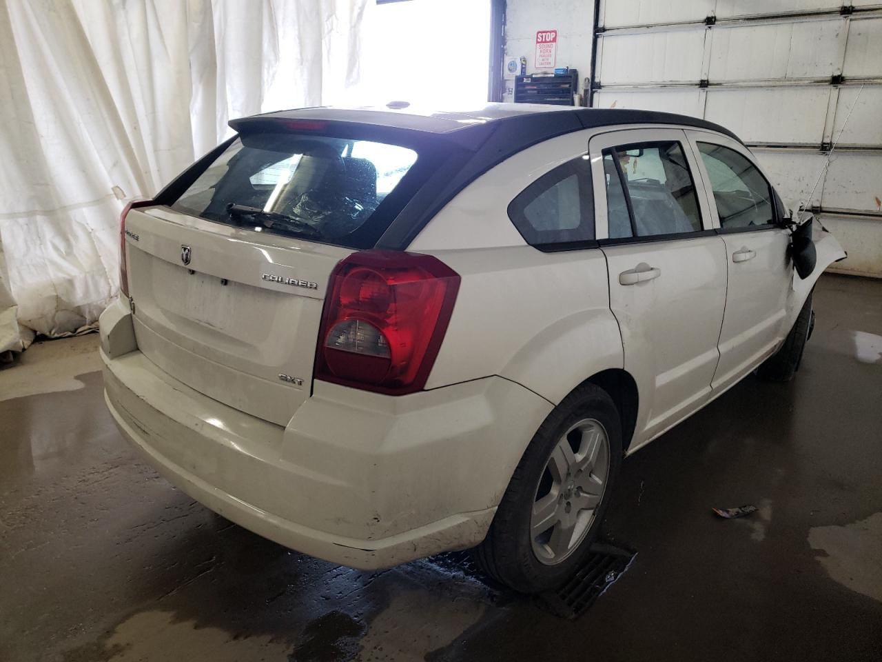 Фото 4 с аукциона – 2009 DODGE CALIBER SX с VIN 1B3HB48A09D184655