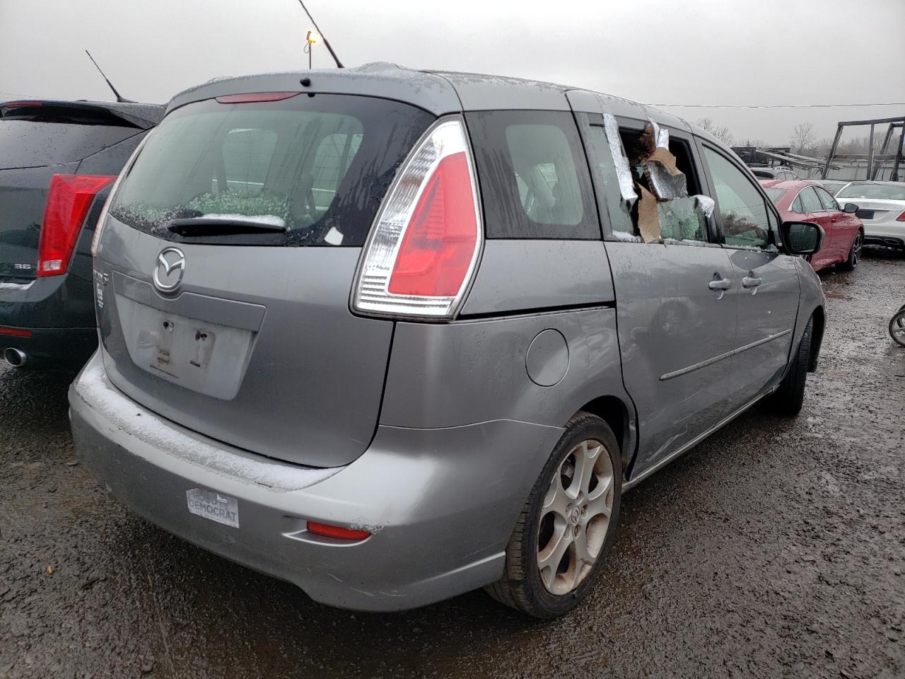 Photo 4 from auction – 2010 MAZDA 5 with VIN JM1CR2WL2A0376099