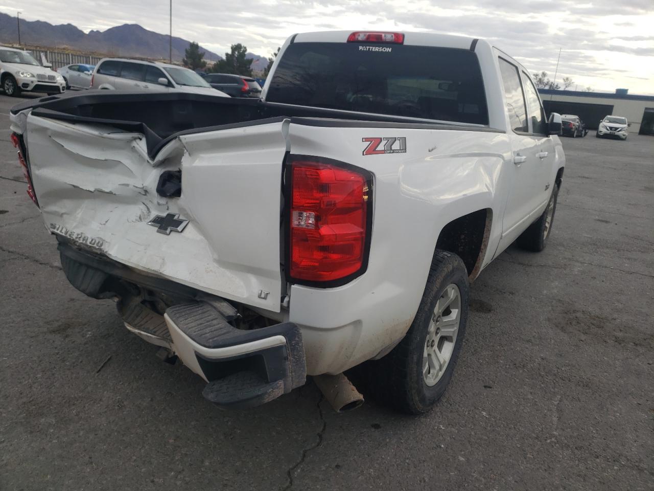 Photo 4 from auction – 2018 CHEVROLET SILVERADO with VIN 3GCUKREC9JG351487