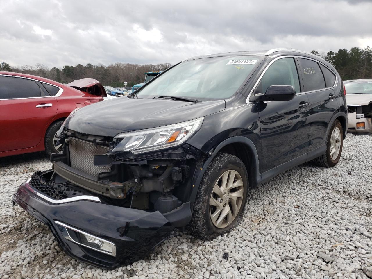 Photo 2 from auction – 2015 HONDA CR-V EXL with VIN 5J6RM4H76FL133190