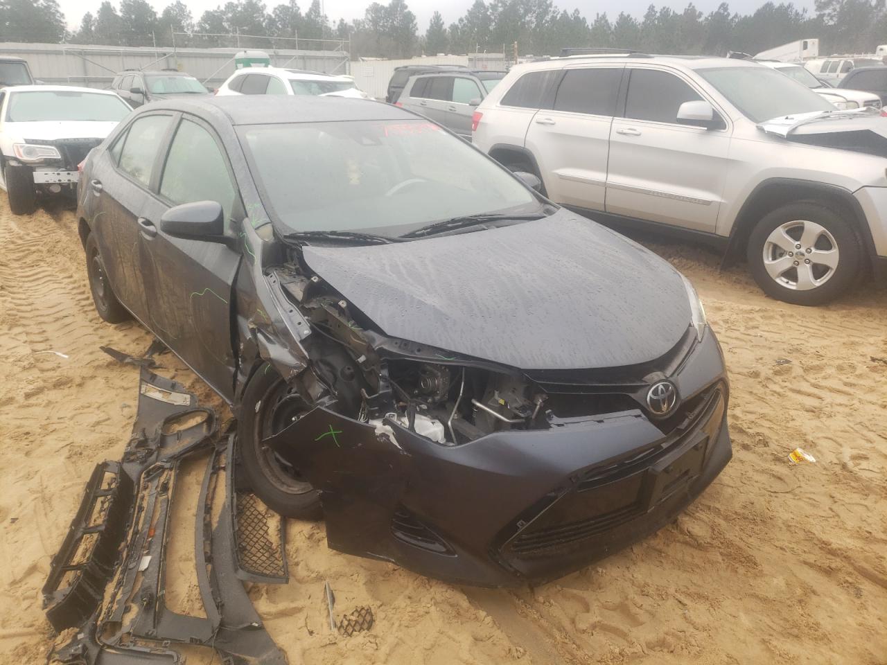 TOYOTA COROLLA L 2019 with VIN 5YFBURHE3KP875342 - Photo from auction