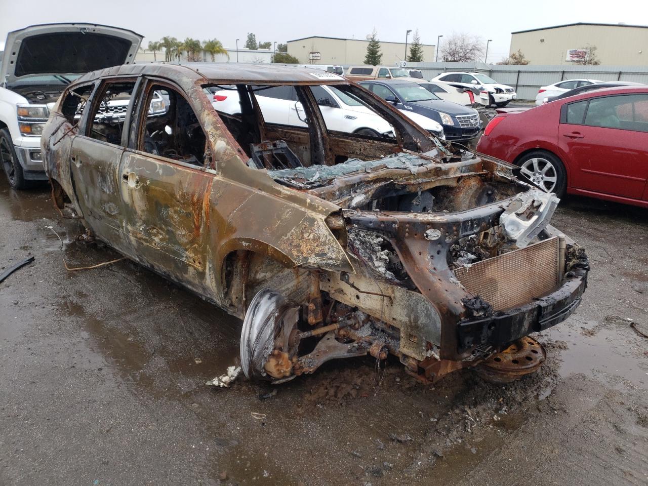 CHEVROLET TRAVERSE L 2011 with VIN 1GNKRJED4BJ142632 - Photo from auction