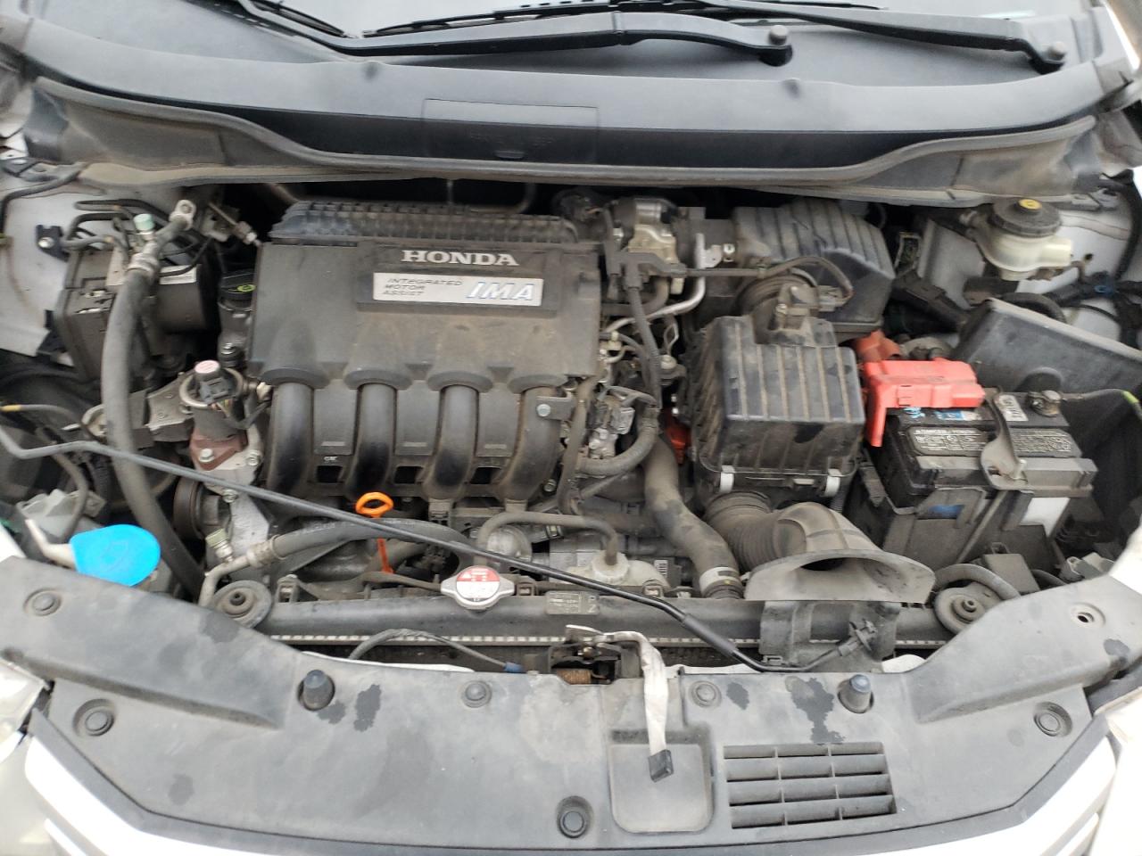 Photo 7 from auction – 2010 HONDA INSIGHT EX with VIN JHMZE2H77AS038111