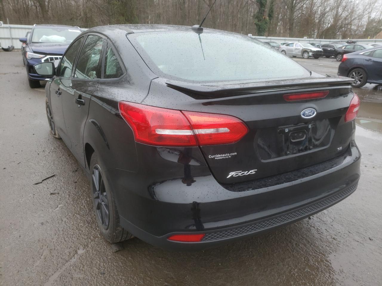 Photo 3 from auction – 2018 FORD FOCUS SE with VIN 1FADP3F27JL319988