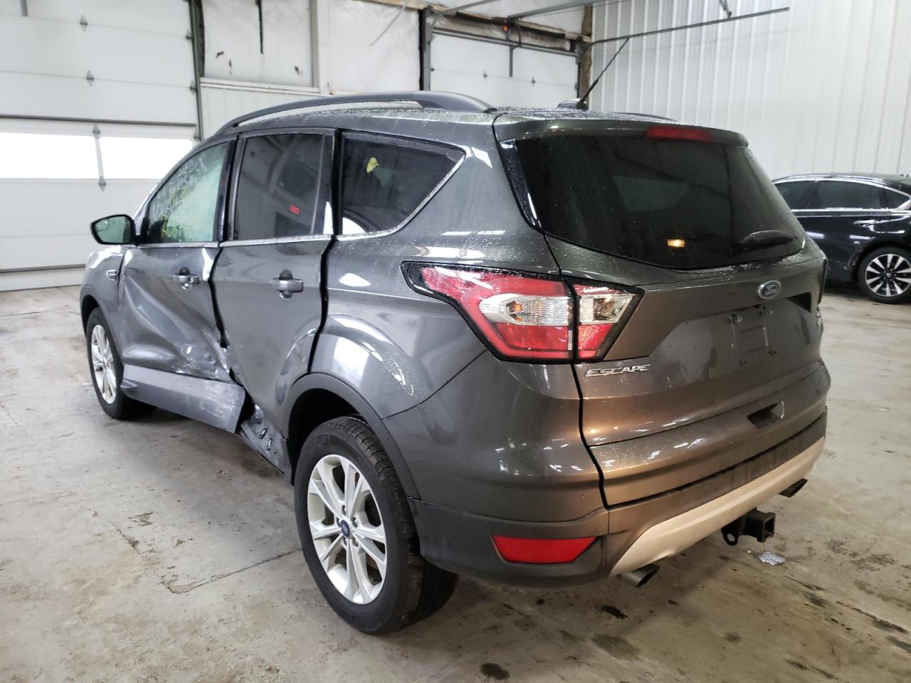 Photo 3 from auction – 2018 FORD ESCAPE SE with VIN 1FMCU9GD7JUB82686