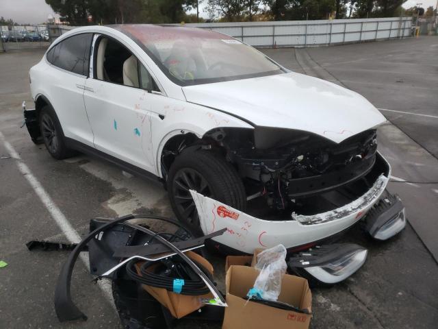 TESLA MODEL X 2018 with VIN 5YJXCBE29JF089663 - Photo from auction