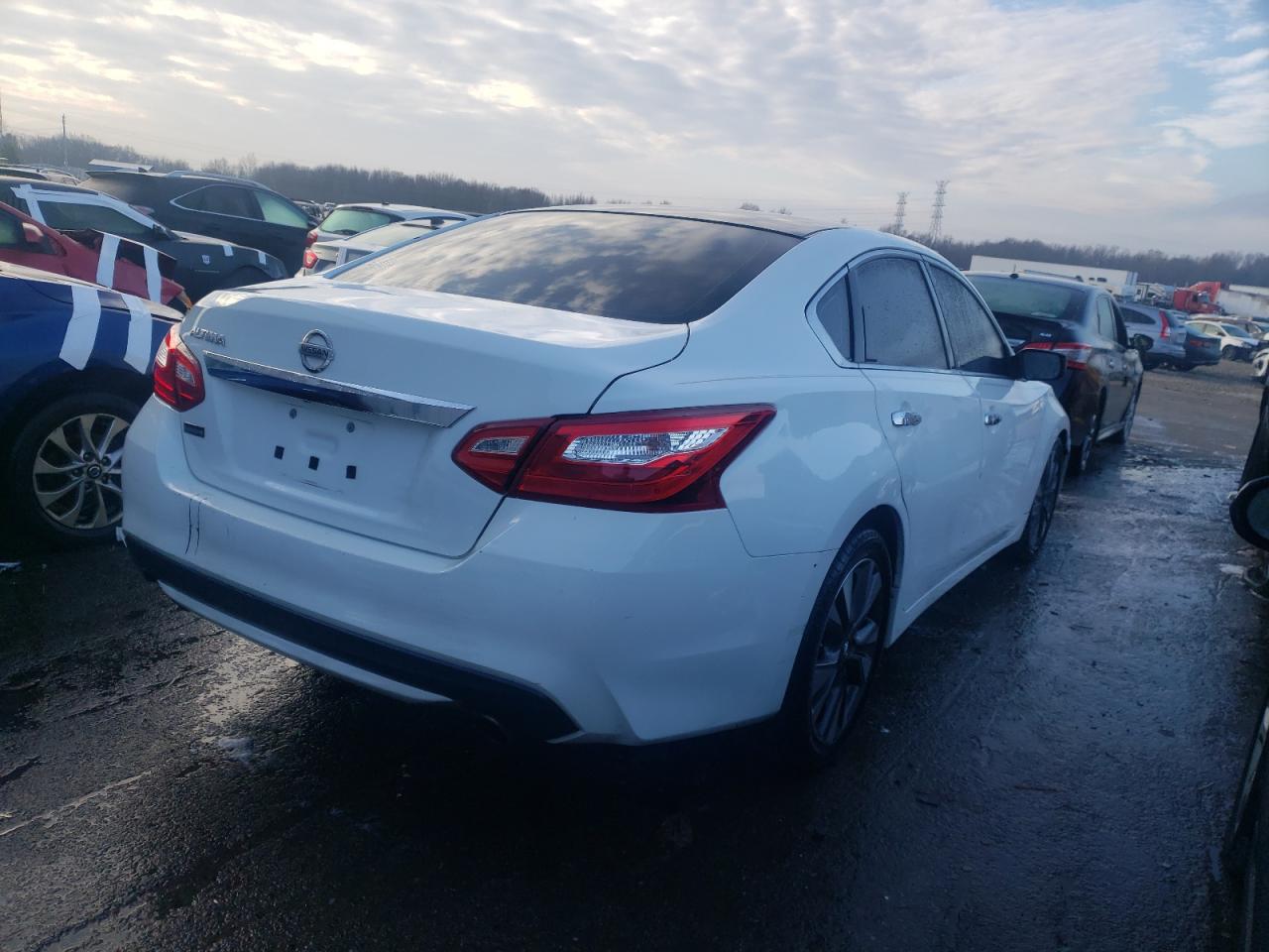Photo 4 from auction – 2016 NISSAN ALTIMA 2.5 with VIN 1N4AL3AP5GN311547