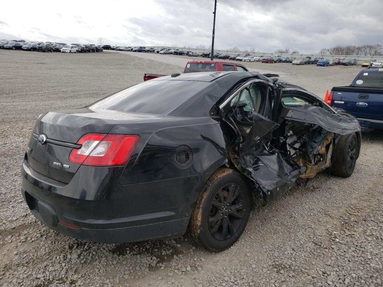Photo 4 from auction – 2011 FORD TAURUS SEL with VIN 1FAHP2HW9BG148893