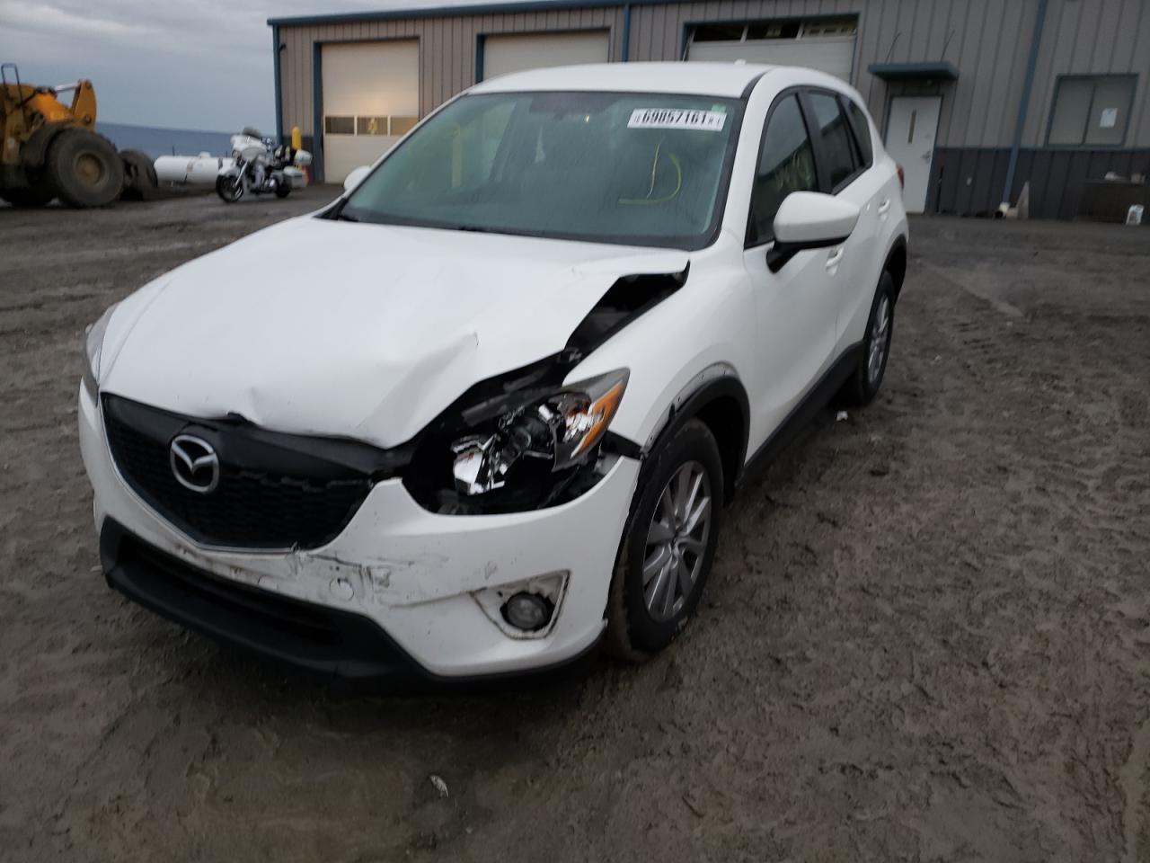 Photo 9 from auction – 2015 MAZDA CX-5 SPORT with VIN JM3KE4BE3F0446556