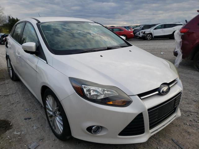 FORD FOCUS TITA 2014 with VIN 1FADP3J2XEL173048 - Photo from auction