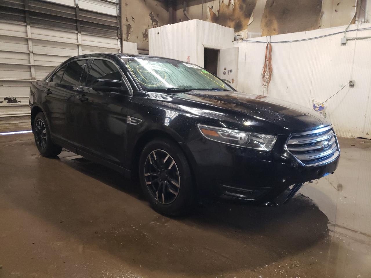 FORD TAURUS SEL 2016 with VIN 1FAHP2E81GG147931 - Photo from auction