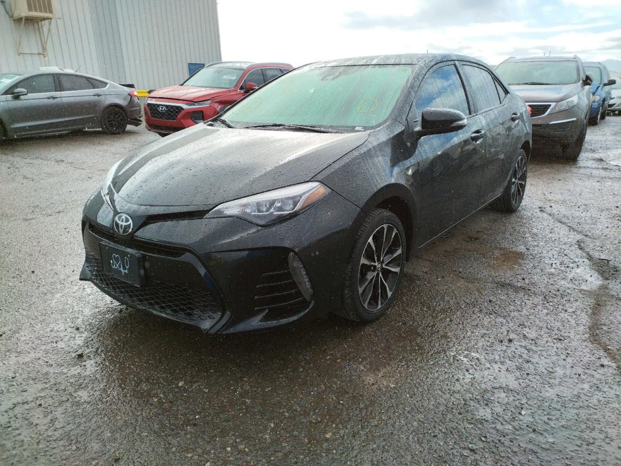 Photo 2 from auction – 2017 TOYOTA COROLLA L with VIN 2T1BURHEXHC935092