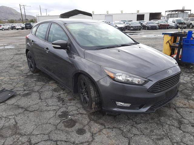 FORD FOCUS SE 2016 with VIN 1FADP3KE6GL230552 - Photo from auction