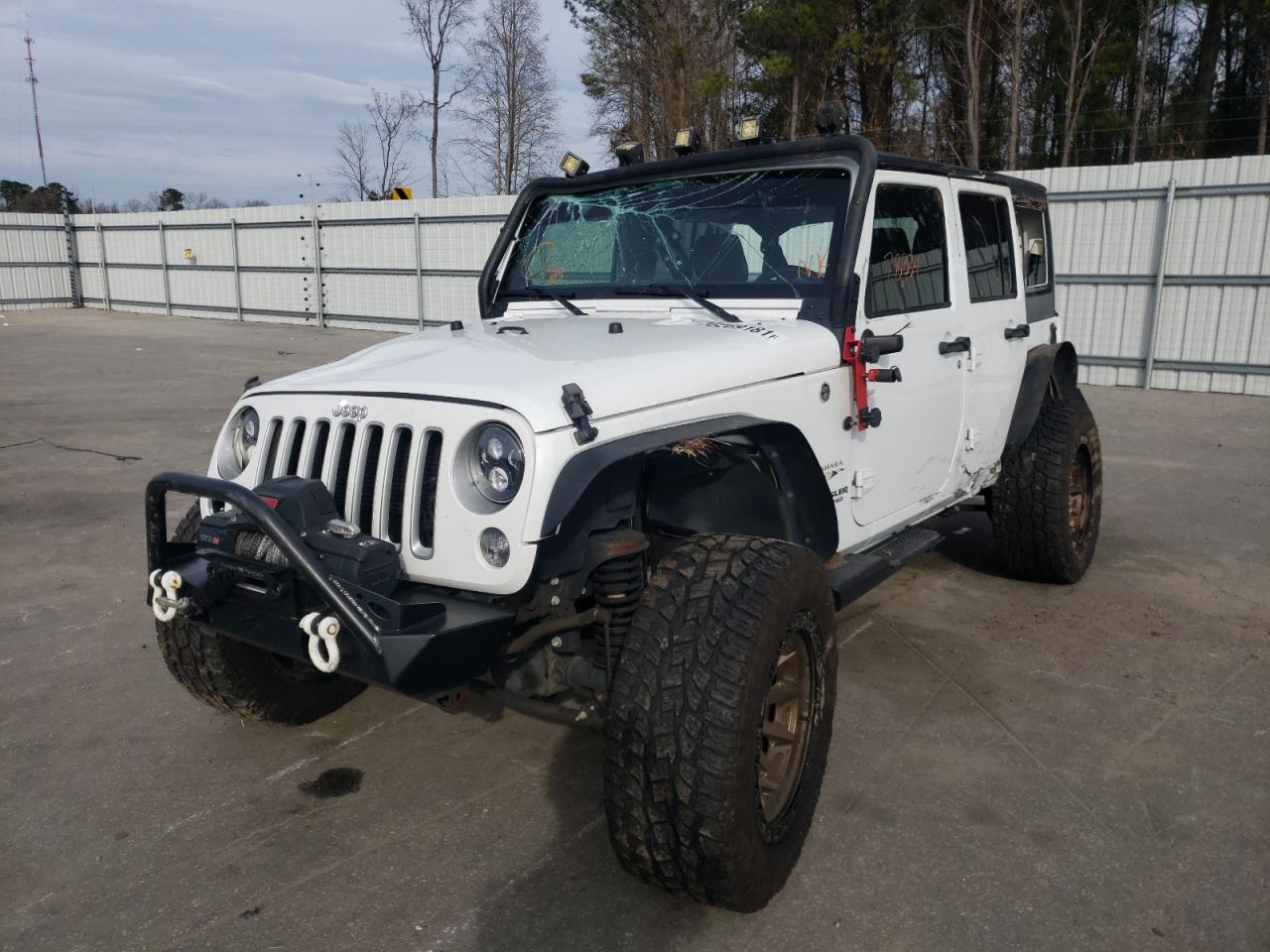 Photo 2 from auction – 2016 JEEP WRANGLER U with VIN 1C4HJWEGXGL201020