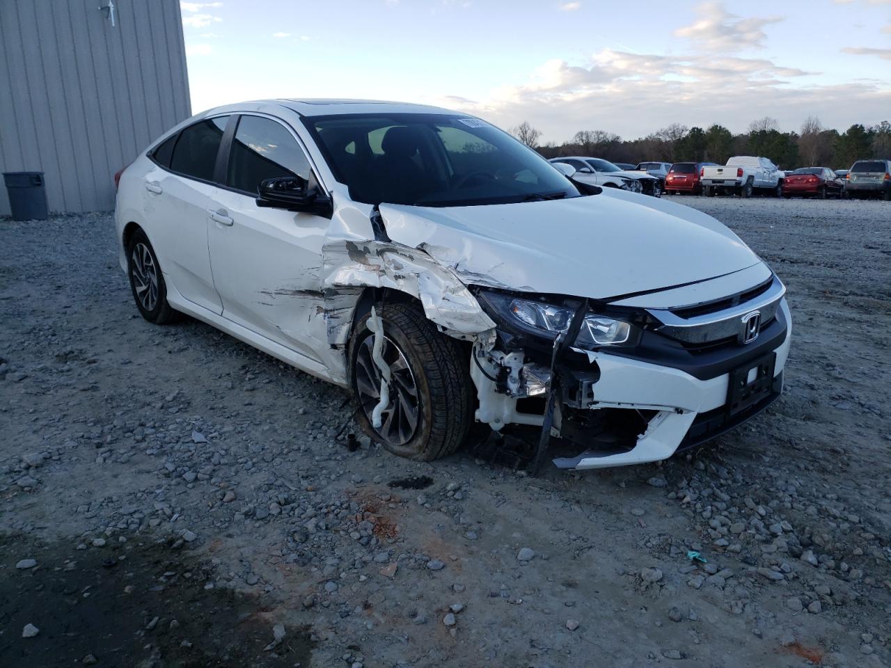 HONDA CIVIC EX 2017 with VIN 19XFC2F73HE067017 - Photo from auction
