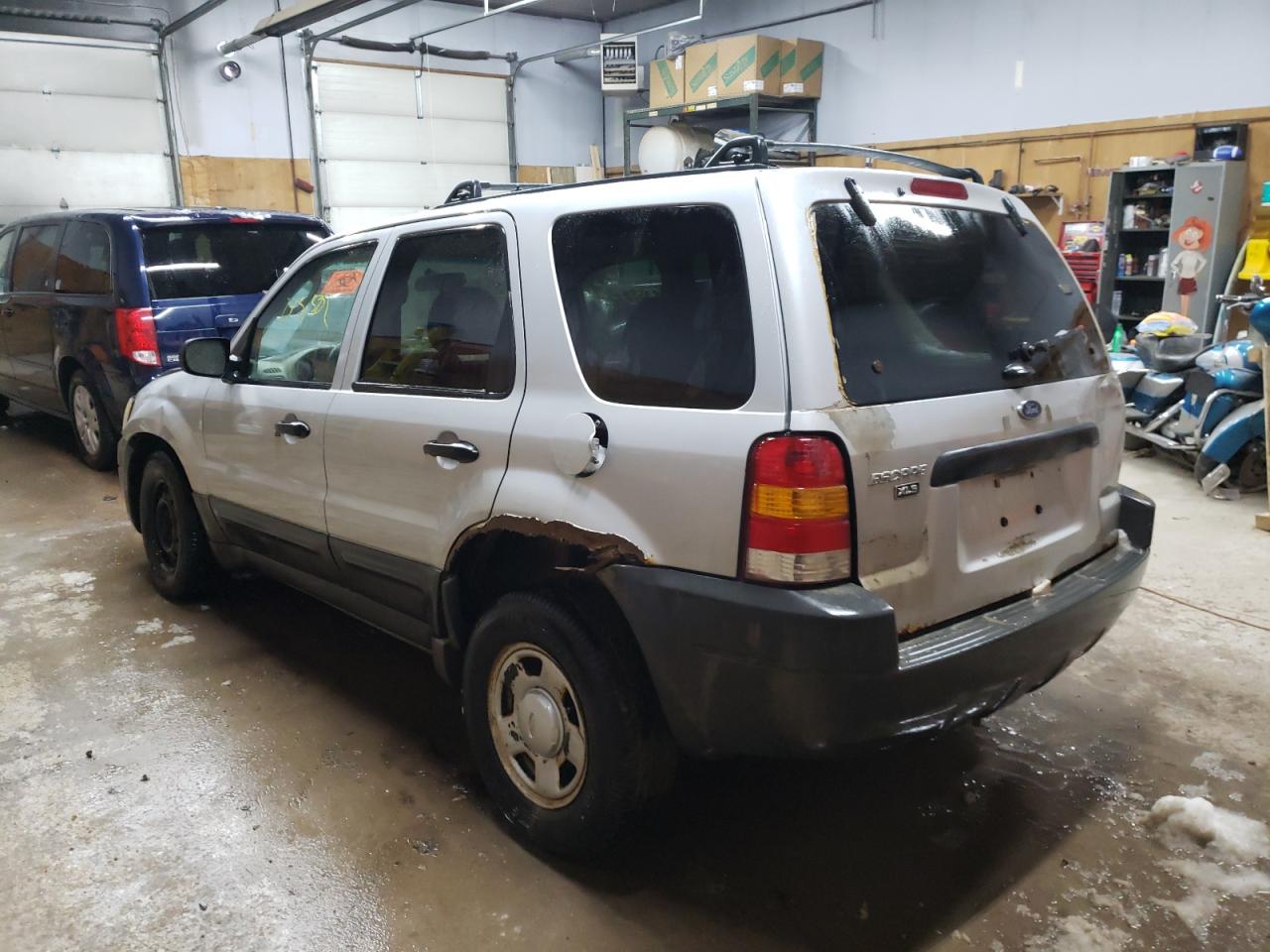 Photo 3 from auction – 2003 FORD ESCAPE XLS with VIN 1FMCU92163KB09742