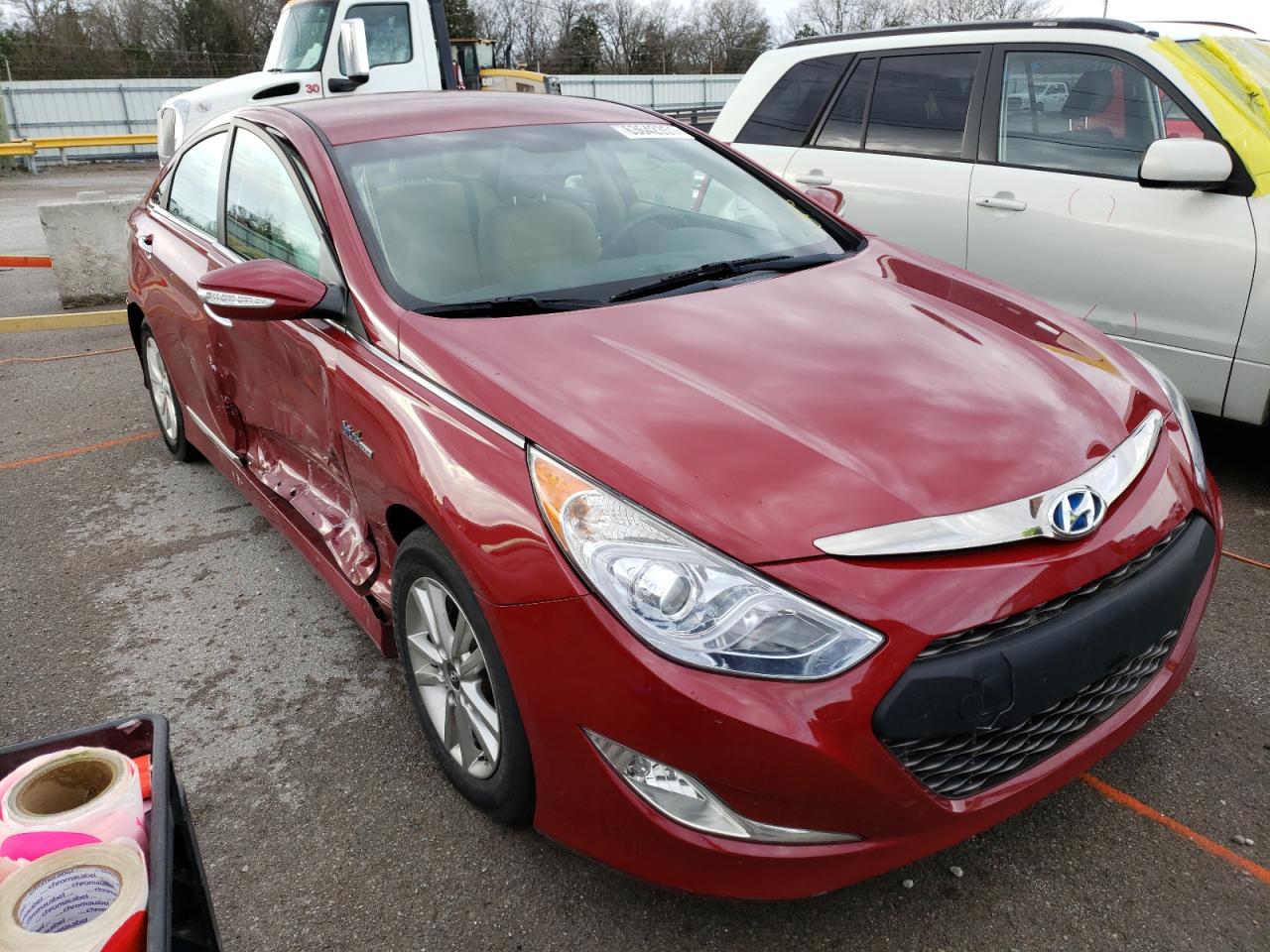 HYUNDAI SONATA HYB 2015 with VIN KMHEC4A42FA125179 - Photo from auction