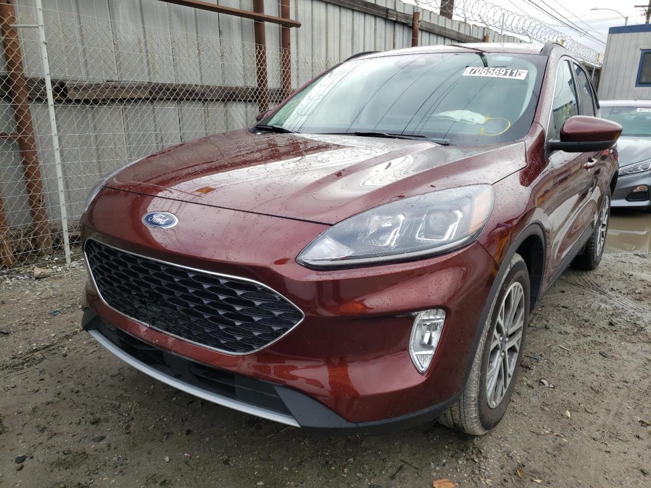 Photo 2 from auction – 2021 FORD ESCAPE SEL with VIN 1FMCU9H63MUA64865