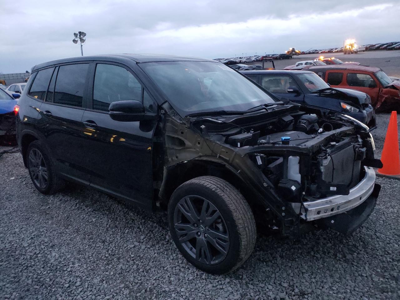 HONDA PASSPORT E 2019 with VIN 5FNYF7H56KB005637 - Photo from auction