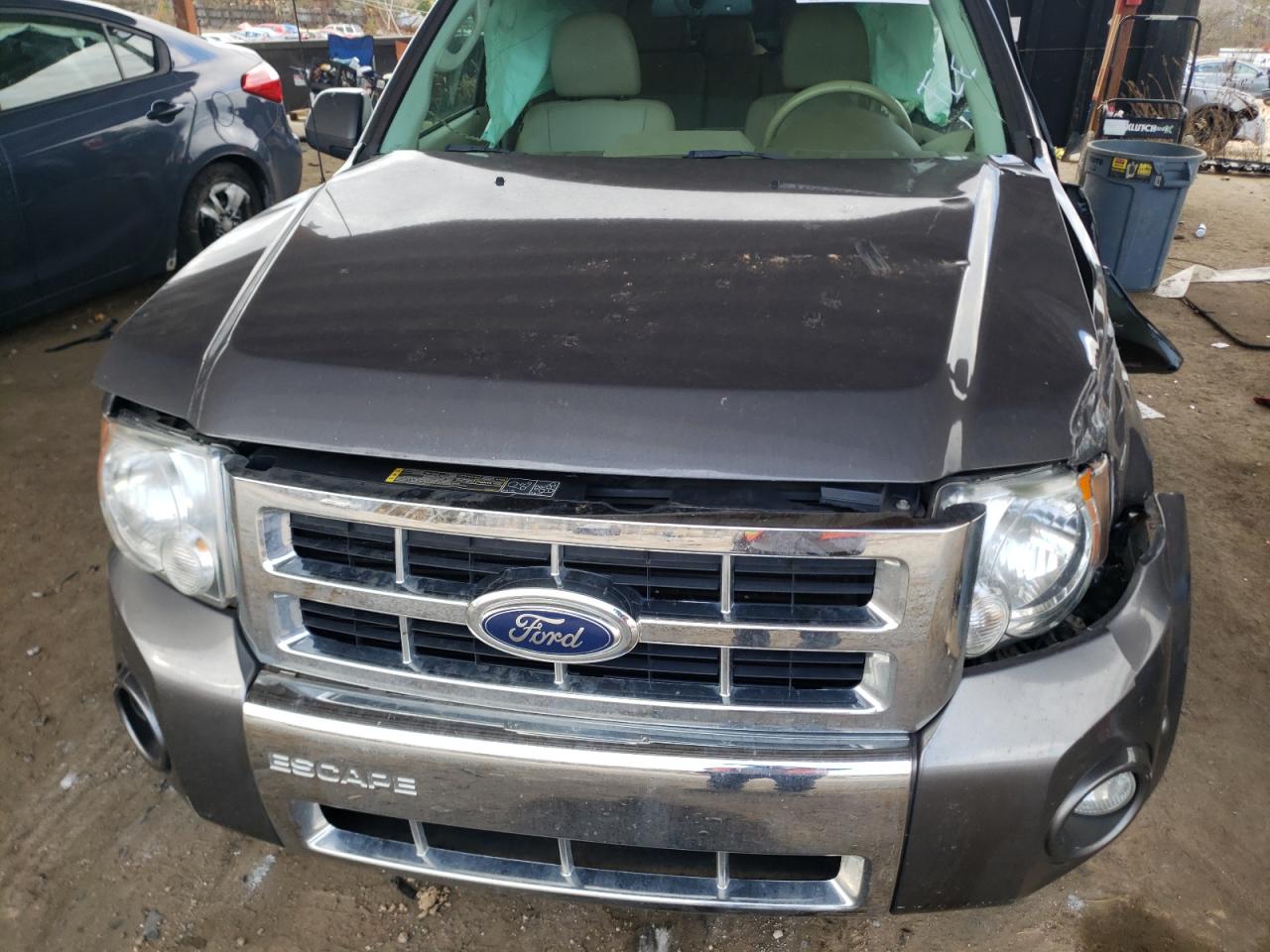 Photo 7 from auction – 2011 FORD ESCAPE LIM with VIN 1FMCU0EG5BKB50972