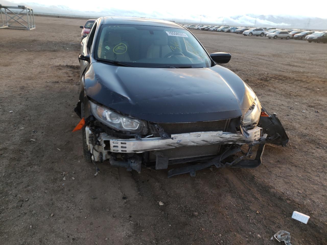 Photo 9 from auction – 2016 HONDA CIVIC EX with VIN 19XFC1F34GE204908