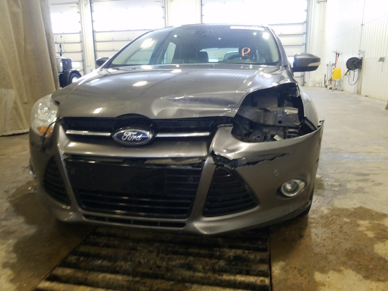 Photo 9 from auction – 2012 FORD FOCUS SEL with VIN 1FAHP3M24CL364555