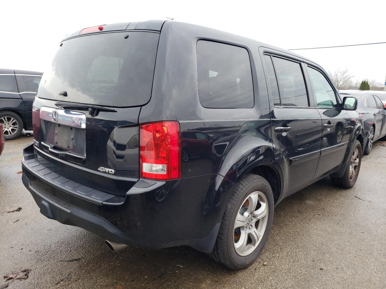 Photo 4 from auction – 2014 HONDA PILOT EXL with VIN 5FNYF4H50EB057302