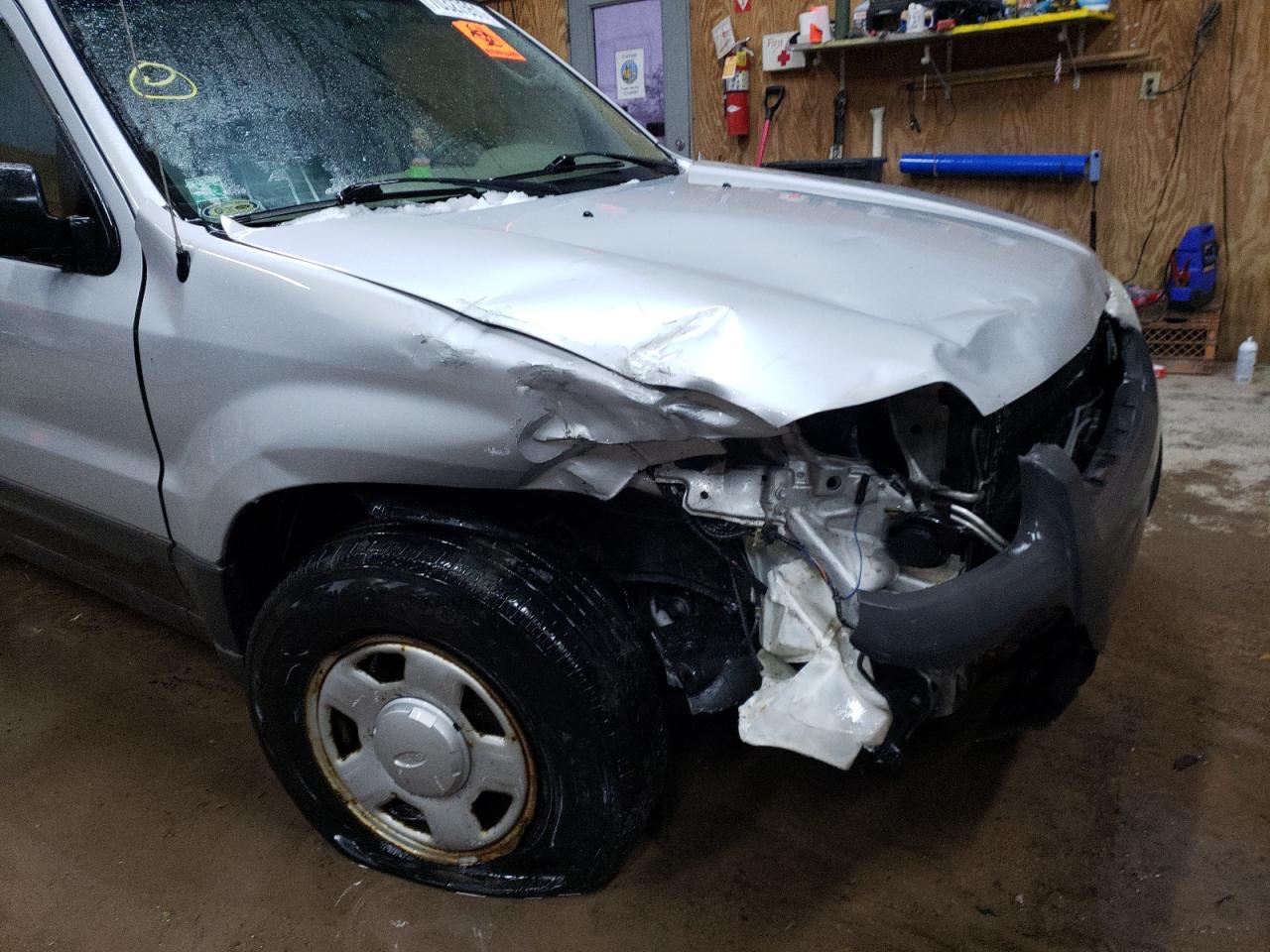 Photo 9 from auction – 2003 FORD ESCAPE XLS with VIN 1FMCU92163KB09742