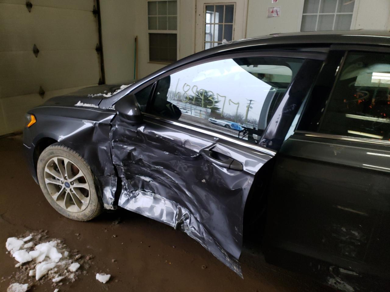 Photo 9 from auction – 2020 FORD FUSION SE with VIN 3FA6P0HD7LR140733
