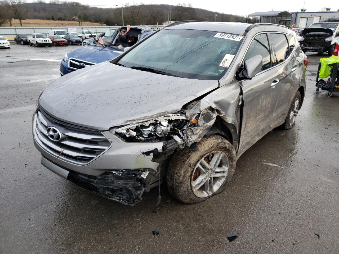 Photo 2 from auction – 2017 HYUNDAI SANTA FE S with VIN 5NMZU3LBXHH003641