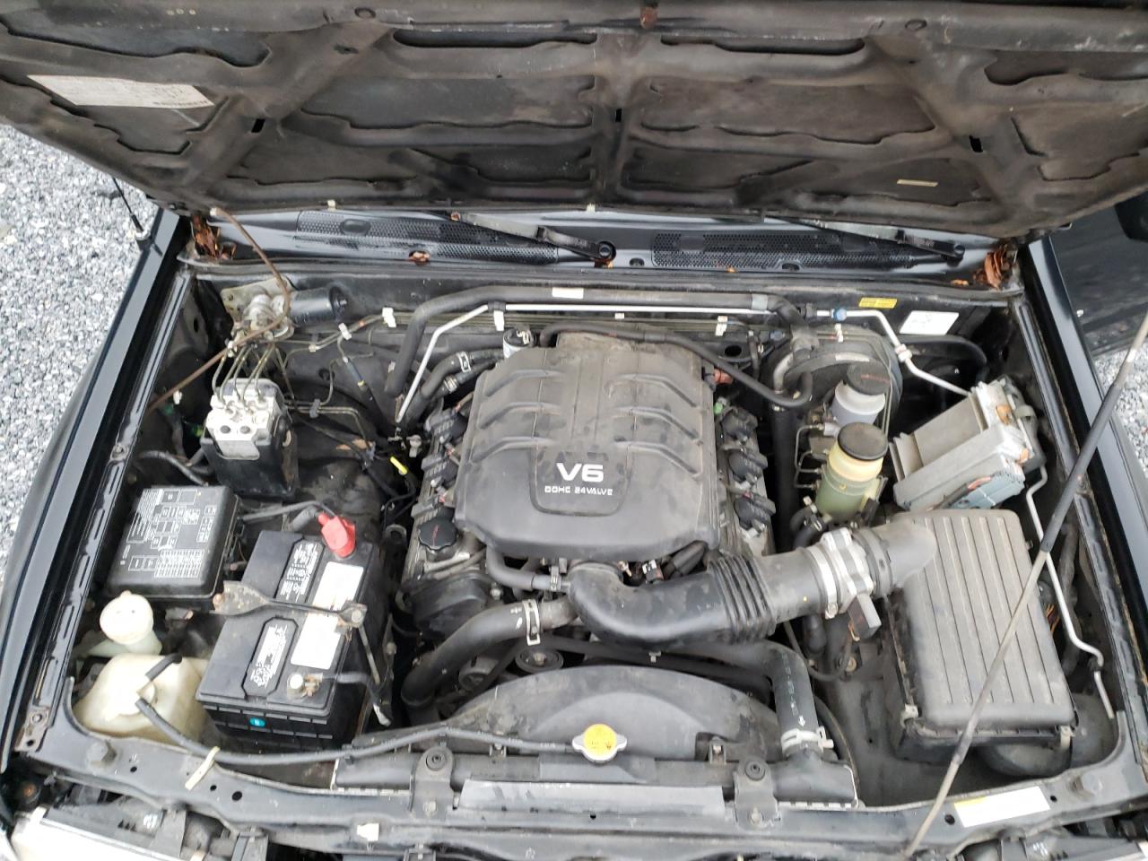 Photo 12 from auction – 2003 ISUZU RODEO with VIN 4S2CK58W634305971