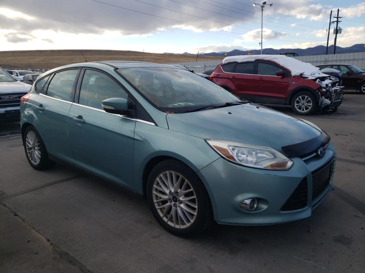 FORD FOCUS 2012 with VIN 1FAHP3M24CL156255 - Photo from auction